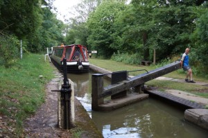 Pat driving, while Ed mans the lock gate